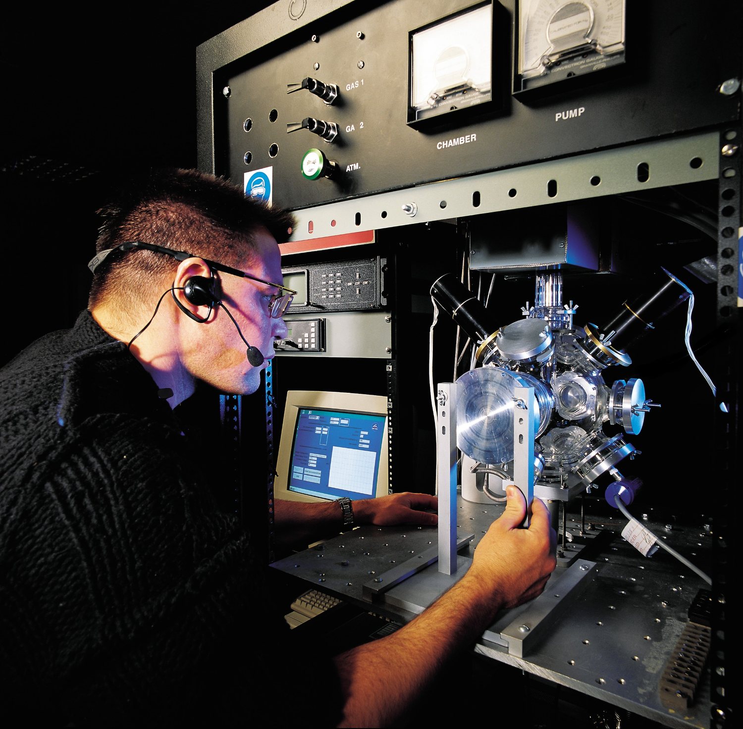 Vincent Boucher working with advanced scientific instrumentation